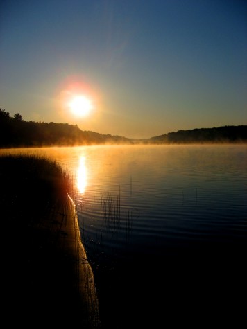A misty sunrise at Muskegon County\'s Duck Lake State Park on July 6, 2007