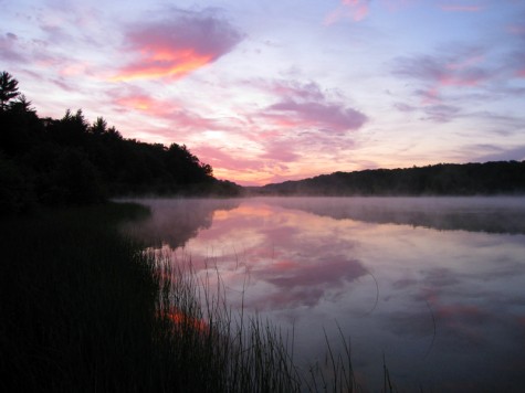 Dawn breaks over the eastern shore of Muskegon County\'s Duck Lake on July 4, 2008
