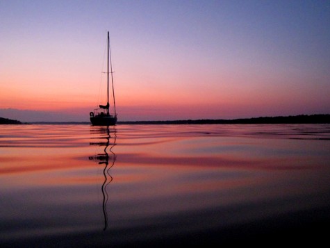 An anchored sailboat early on the morning of August 1, 2008