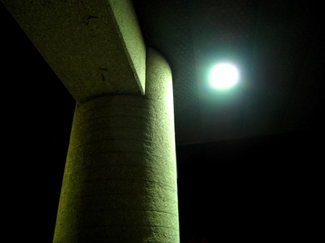 Light throws an interesting shadow on one of the walkway supports at Muskegon High School.