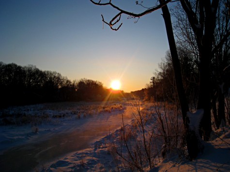 Sun coming up over Muskegon's Ruddiman Creek