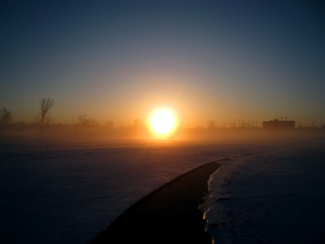 The sunrise through the morning fog across on Muskegon's Lakeshore Bike Trail on February 19, 2010.