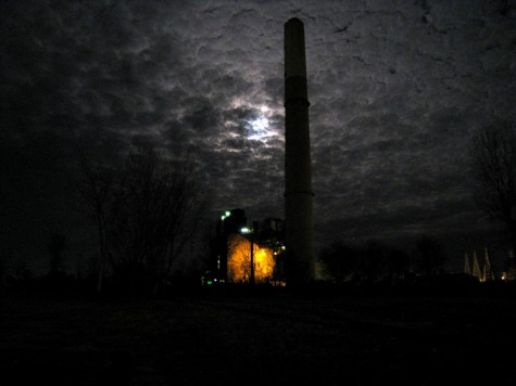 The full moon behind Muskegon's BC Cobb plant