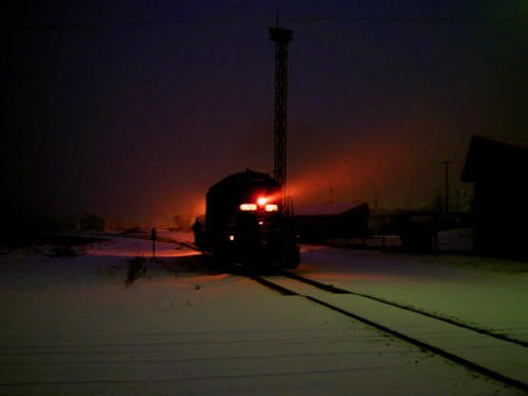 A railroad engine crosses Muskegon's Northern Rail Yard on the morning of January 26, 2010